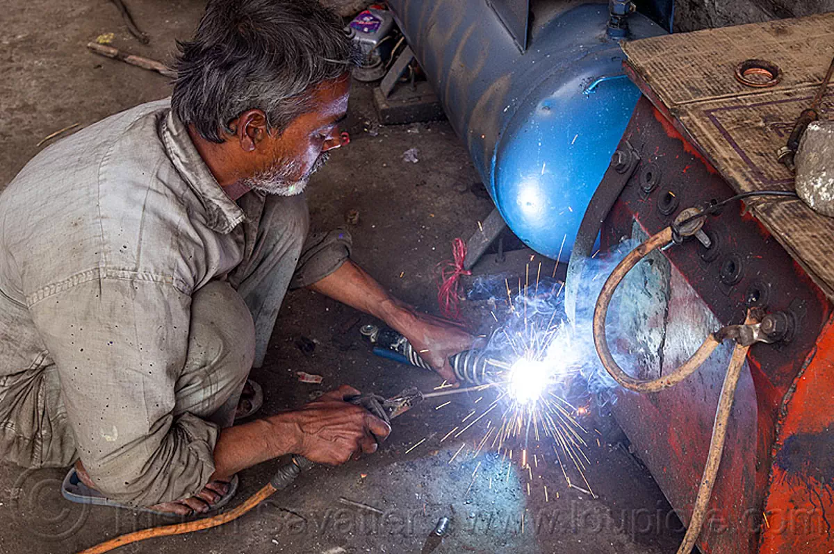 arc welding repair on motorbike shock, india