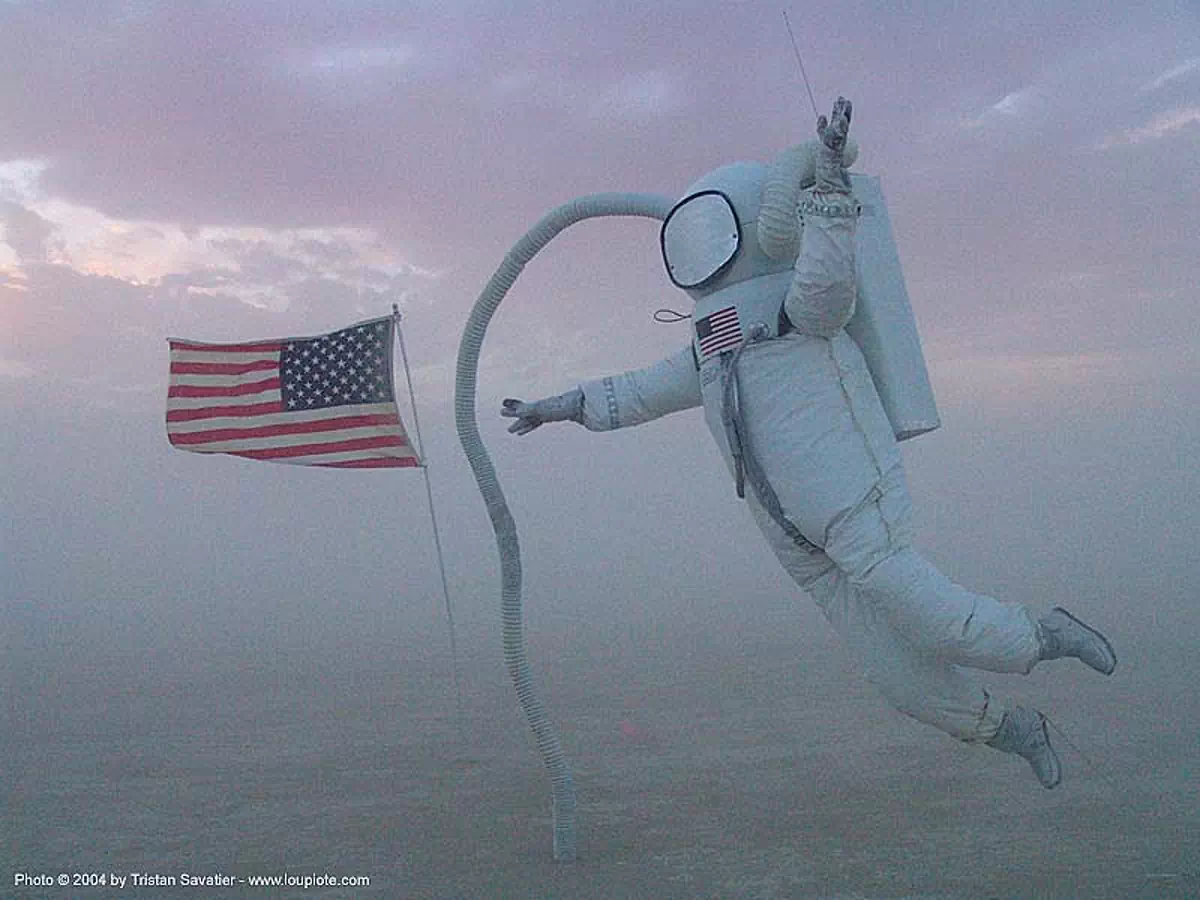 astronaut - moonwalk - moon - burning-man-2004, american flag, art installation, astronaut, burning man, jonathan bickart, moon, moonwalk, us flag