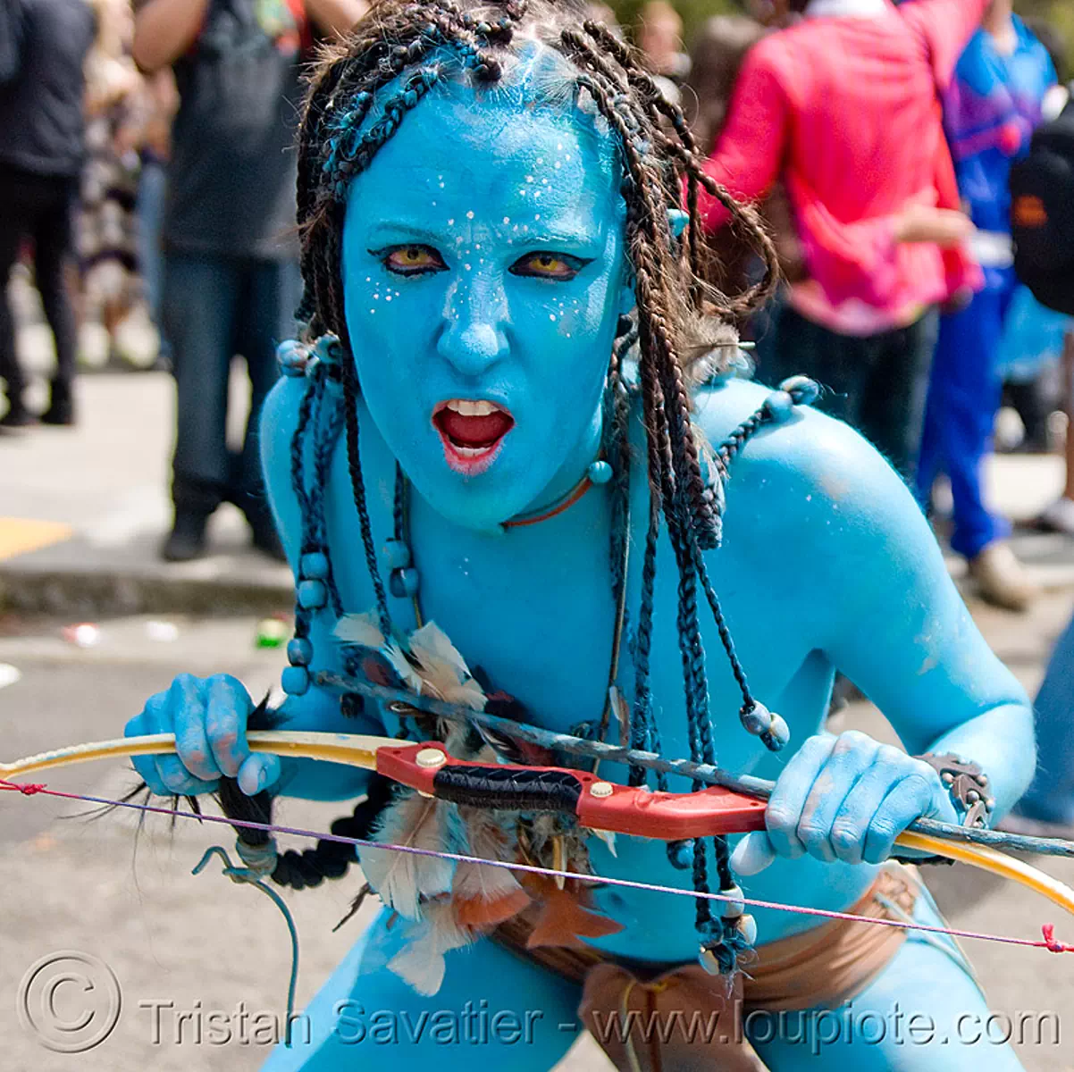 avatar costume - bay to breaker footrace and street party (san francisco), avatar, bay to breakers, beads, blue, body art, body paint, body painting, bow, braid, braided hair, contacts, costume, footrace, special effects contact lenses, street party, theatrical contact lenses, warrior, woman, yellow color contact lenses