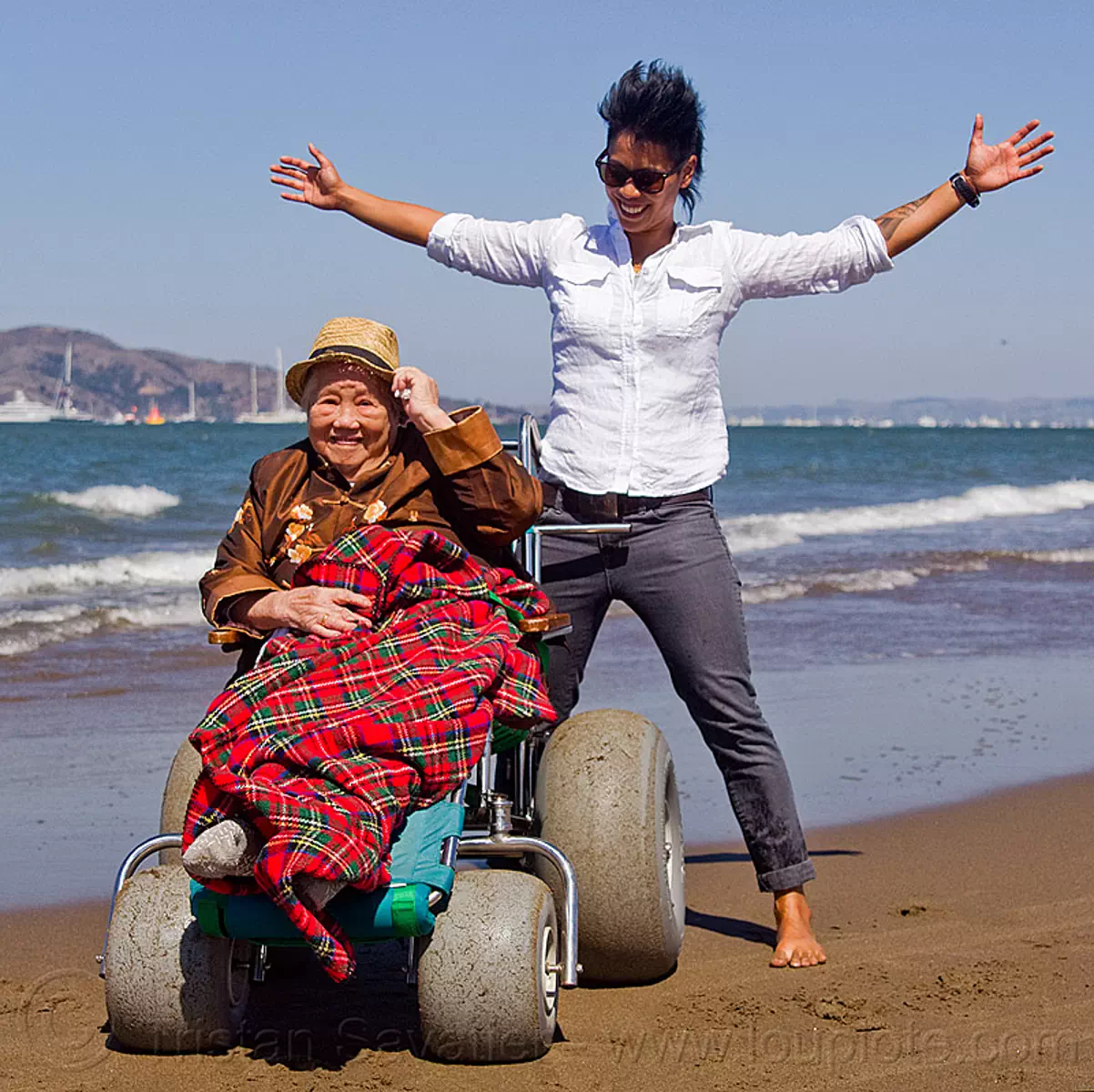 beach wheelchair - grandma and granddaughter, beach wheelchair, blanket, chinese, crissy field beach, family, grandma, grandmother, jenn, old woman, sand, senior, straw hat, women