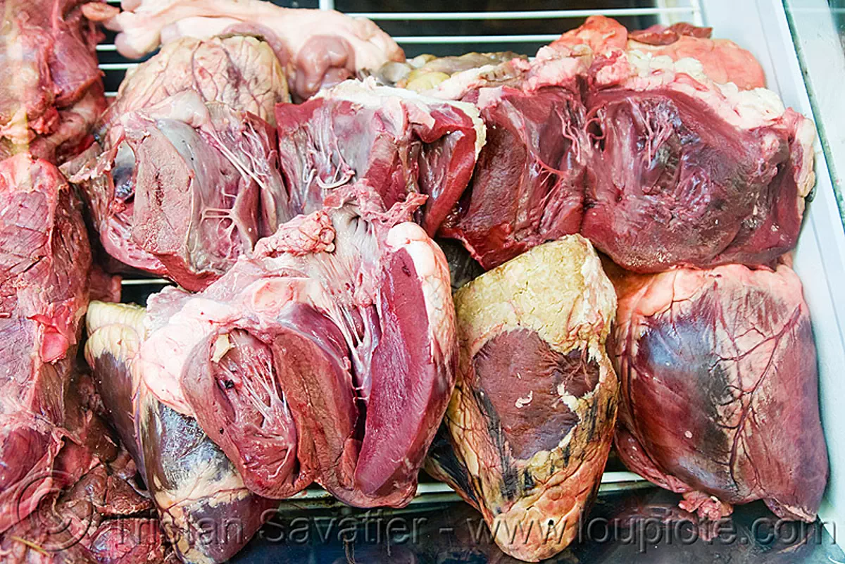 beef hearts in meat shop (argentina), argentina, beef hearts, butcher, meat market, meat shop, mercado central, noroeste argentino, raw meat, salta