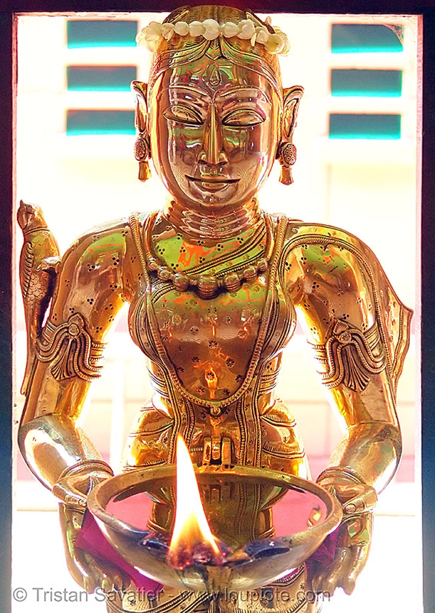 brass statue of a kho me goddess - deity (saigon) - vietnam, brass, burning, fire, goddess, golden color, khmer krom, kho-me, sculpture, statue, vietnam, woman