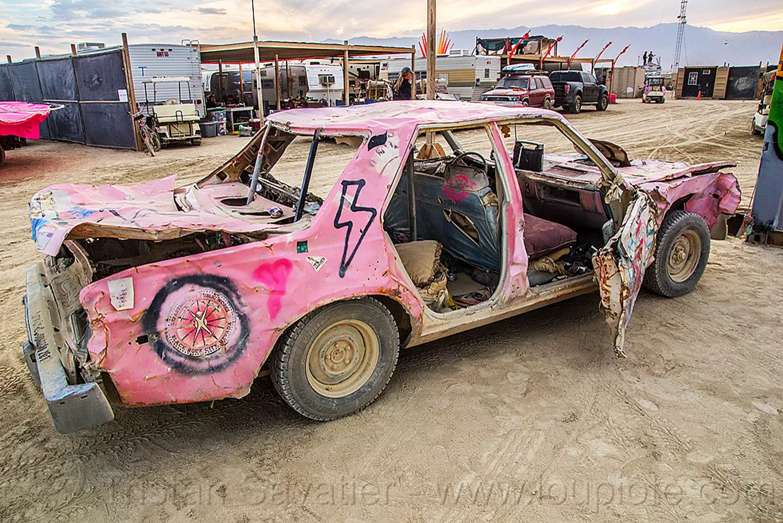 burning man - DPW wrecked pink car, art car, burning man art cars, mutant vehicles, pink car, wreck