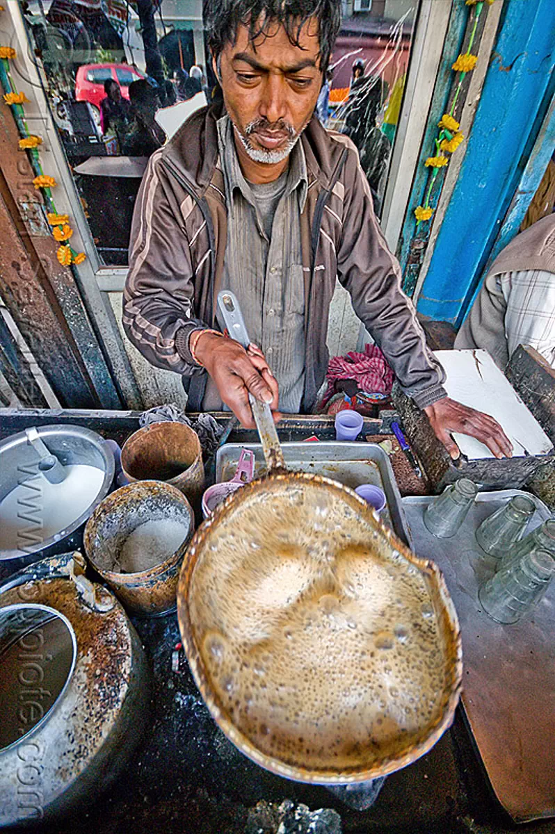 chai wallah boiling chai, boiling, bubbles, bubbling, chai stall, chai wallah, cooking, delhi, india, man, milk tea, paharganj, spice tea, stove, street food, street seller, street vendor, tea stall