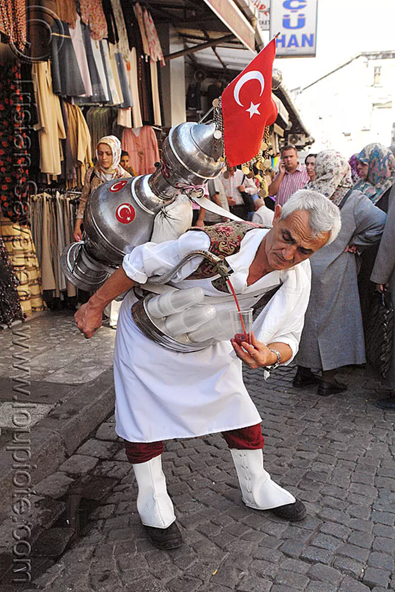 cherry juice vendor, bazaar, cherry juice, cup, flag, istanbul, man, pouring, street seller, street vendor