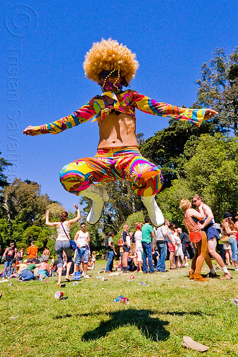 colorful woman jumping, afro hair, bay to breakers, footrace, golden gate park, jump, jumpshot, lawn, street party, woman