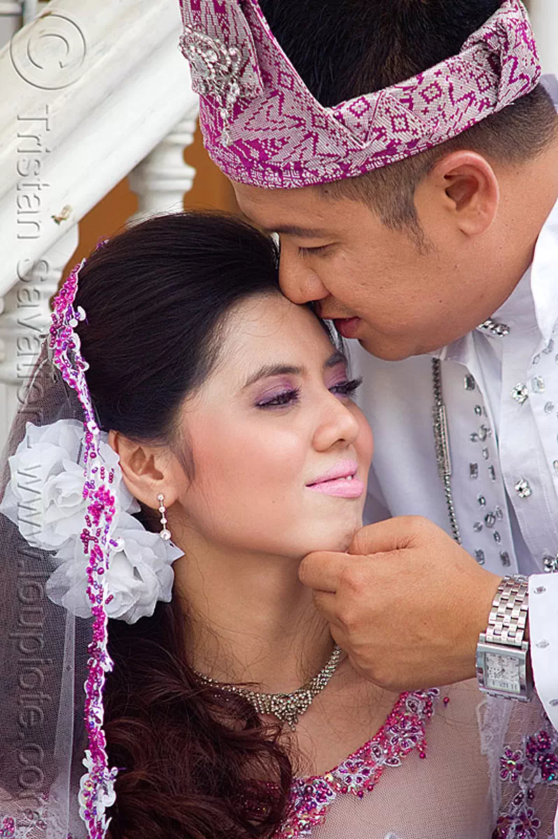 couple kissing - malay wedding - kuching (borneo), borneo, bride, groom, kuching, malay wedding, malaysia, man, traditional wedding, woman
