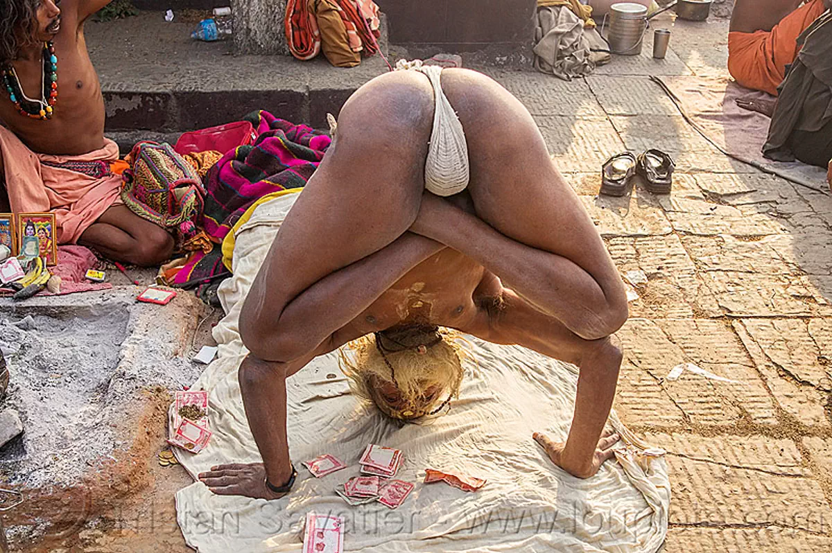 cross-legged hand-stand - yogi sadhu in yoga position (nepal), baba, bank-notes, beard, cross-legged, hindu, hinduism, kathmandu, maha shivaratri, man, money, pashupatinath, sadhu, yoga, yogi