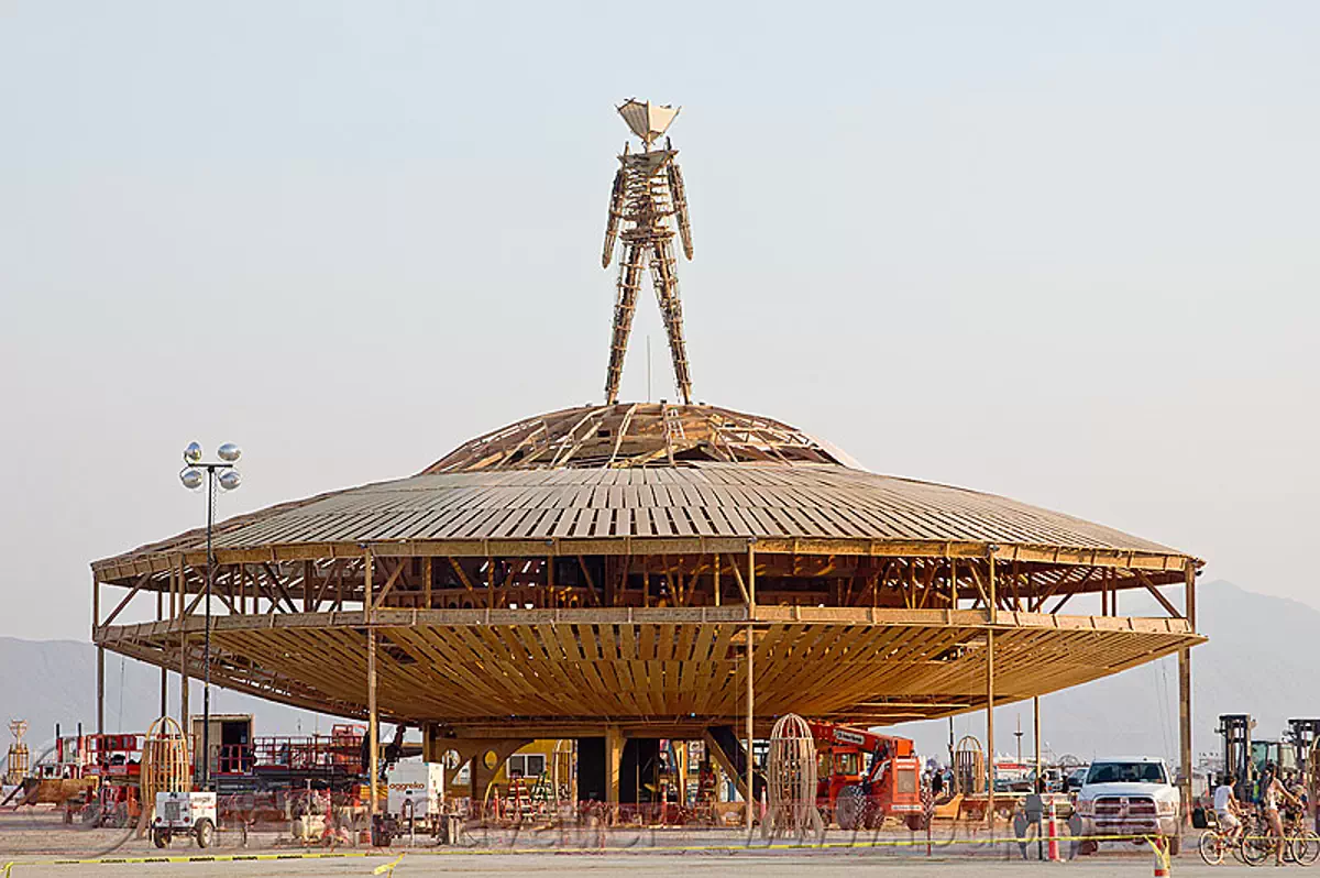 effigy stands on a large flying saucer, burning man 2013