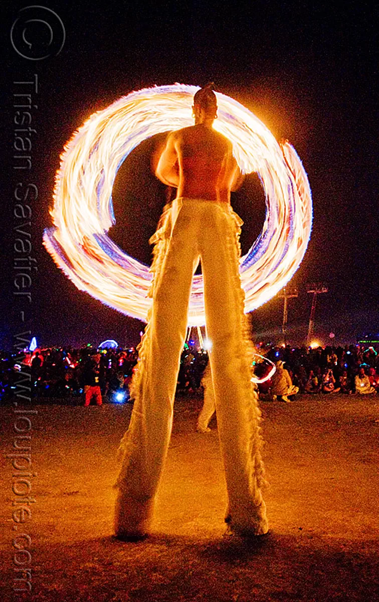 fire conclave, spinning fire ropes on stilts, burning man 2009