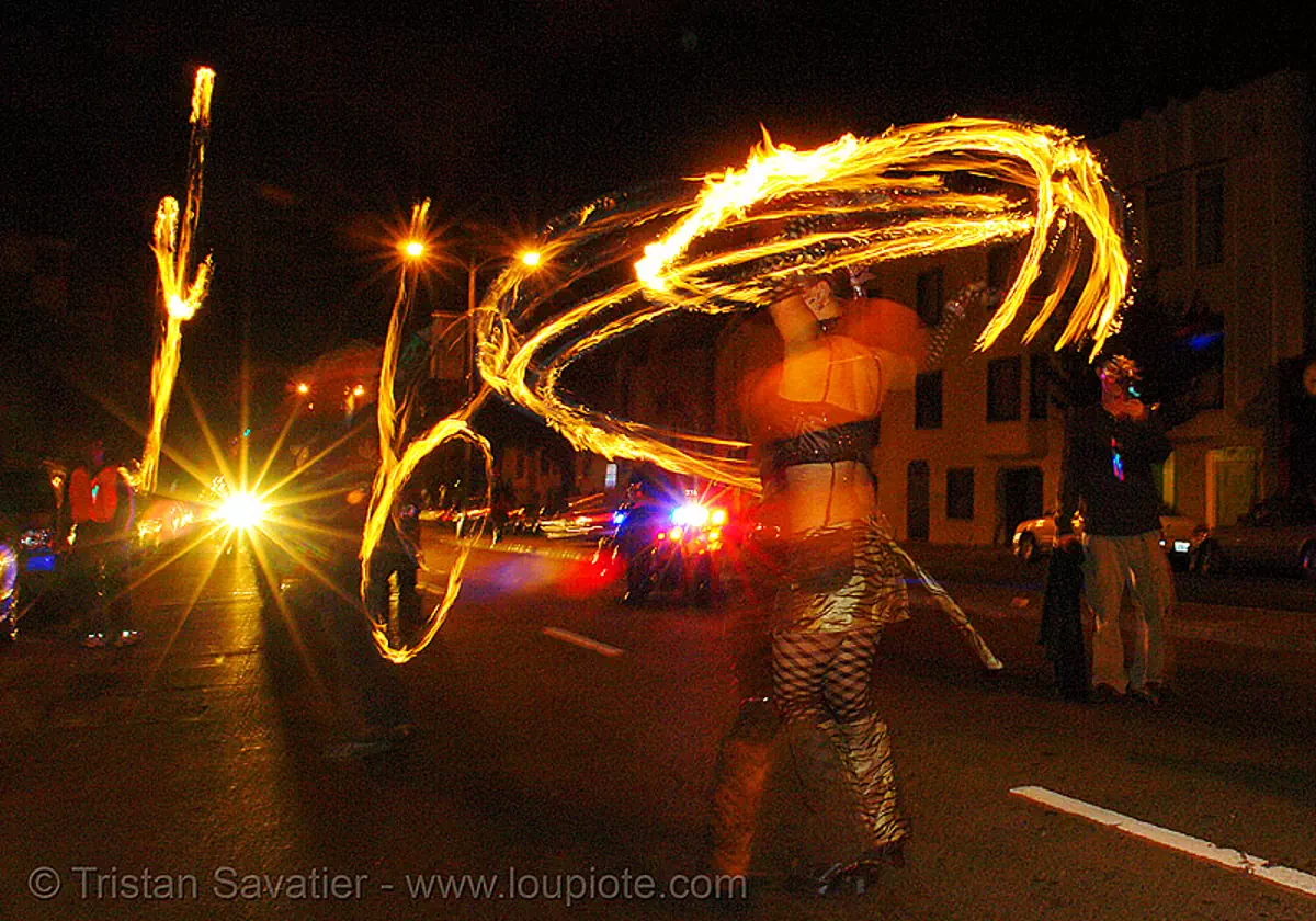 fire dancing in the streets, fire dancer, fire dancing, fire fans, fire performer, fire spinning, march of light, night, pyronauts, spinning fire