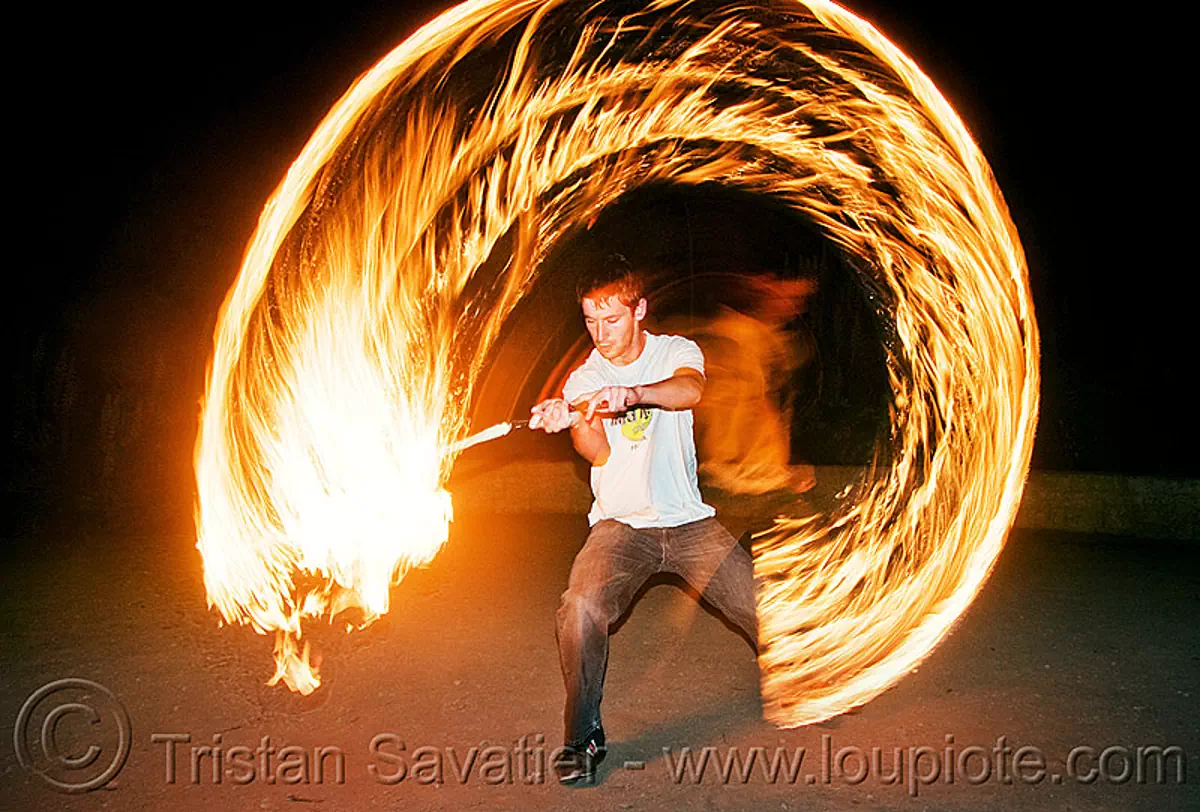 fire performer spinning fire sword (san francisco), fire dancer, fire dancing, fire performer, fire spinning, fire sword, night, spinning fire