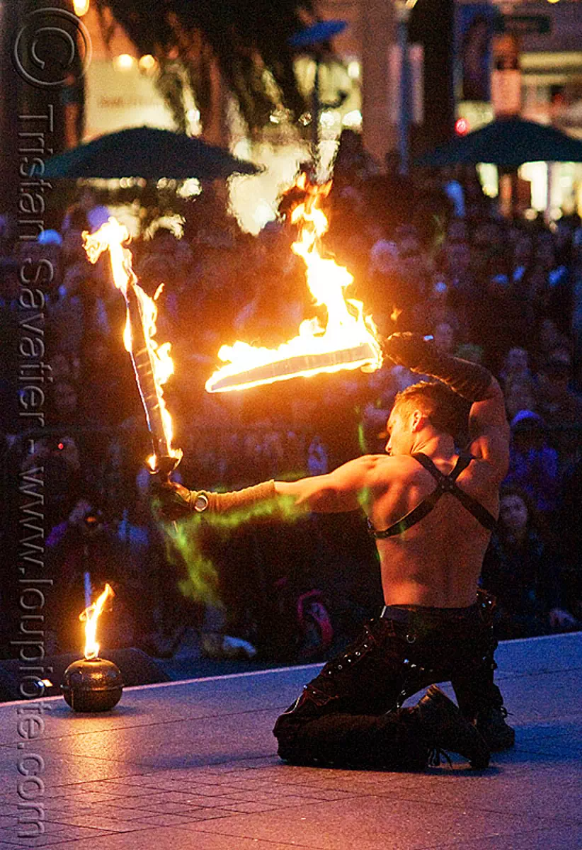 fire swords - performer - temple of poi 2010 fire dancing expo (san francisco), celsius maximus, fire dancer, fire dancing expo, fire performer, fire spinning, fire swords, night, temple of poi, union square