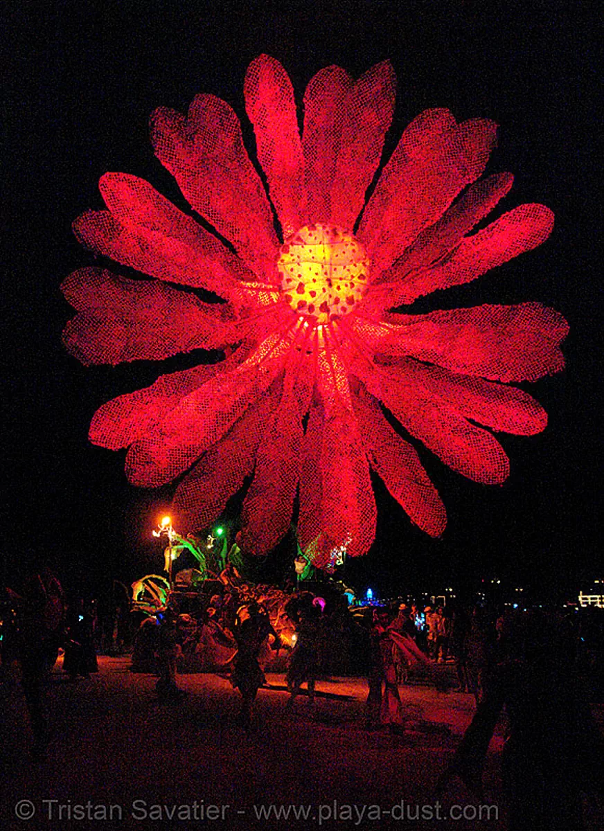 giant red flower - miracle grow aka hope flower - burning-man 2006, art car, burning man, giant flower, glowing, miracle grow, mutant vehicles, night, red