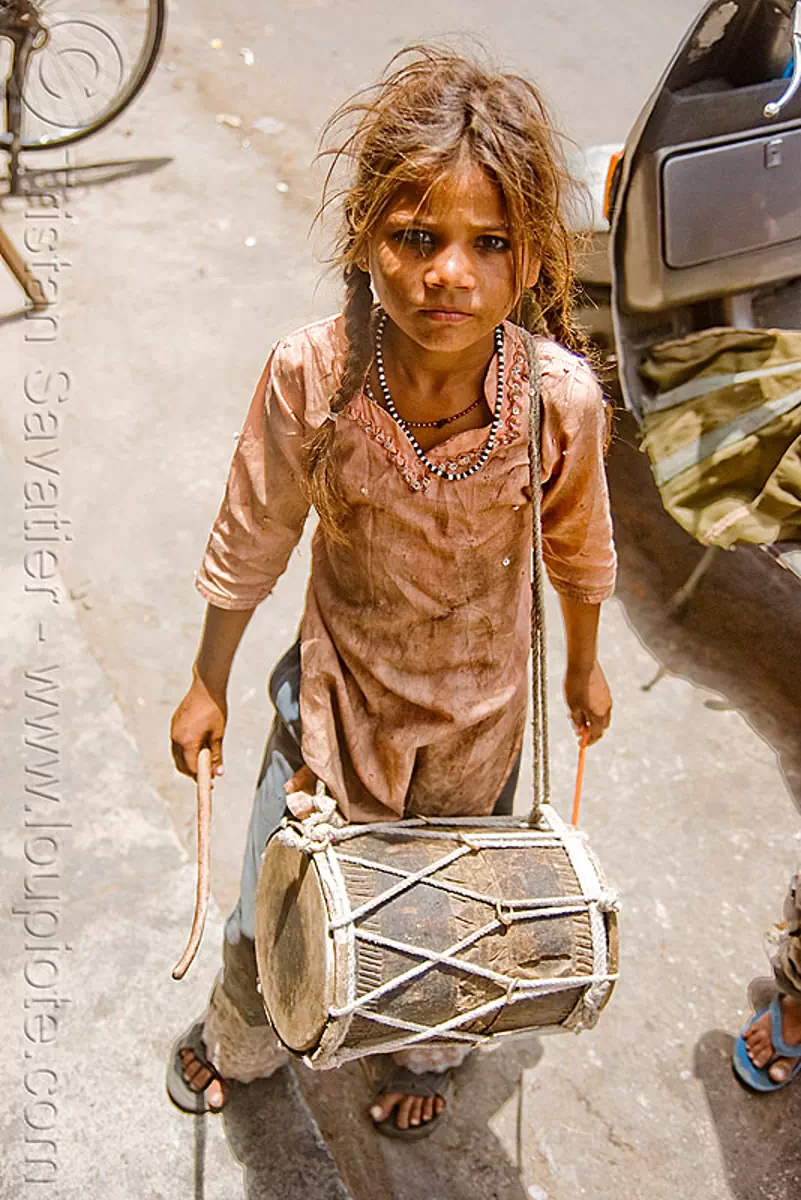 girl drumming - jaipur (india), beggar, begging, child, drum, drumsticks, jaipur, little girl, poor, street kid