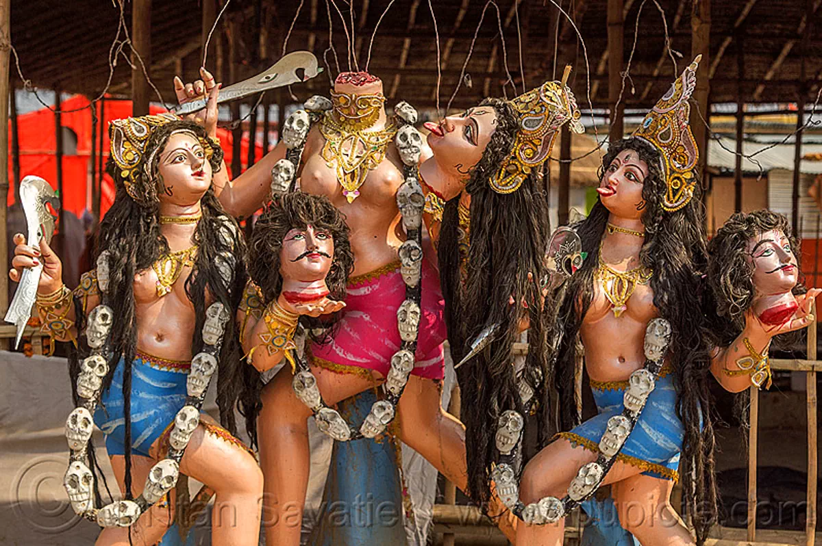 hindu goddess kali with severed heads drinking blood (india), beheaded, blood, decapitated, deities, drinking, goddess, gods, gore, gory, hindu pilgrimage, hinduism, kali maa, kumbh mela, sculpture, severed heads, statue