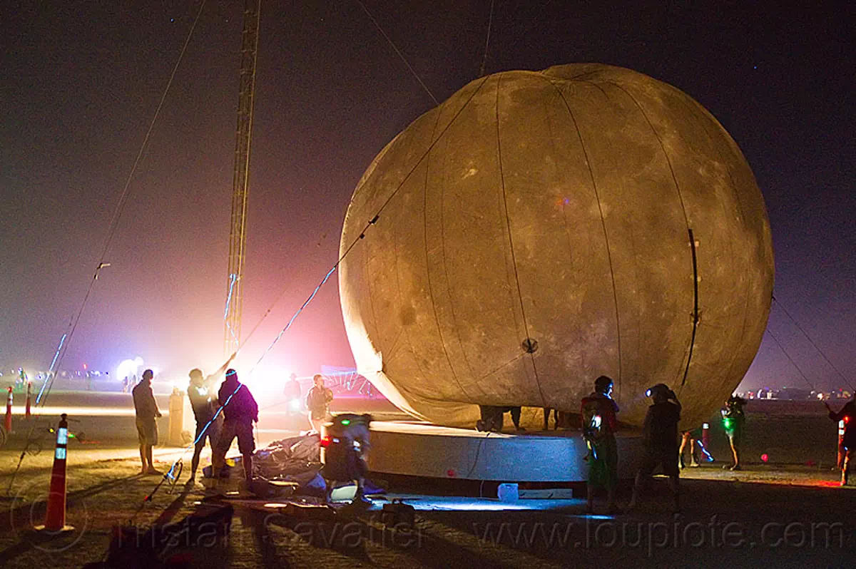 installing the giant inflatable moon - burning man 2012, burning man, inflatable moon, lune and tide, night, silhouettes