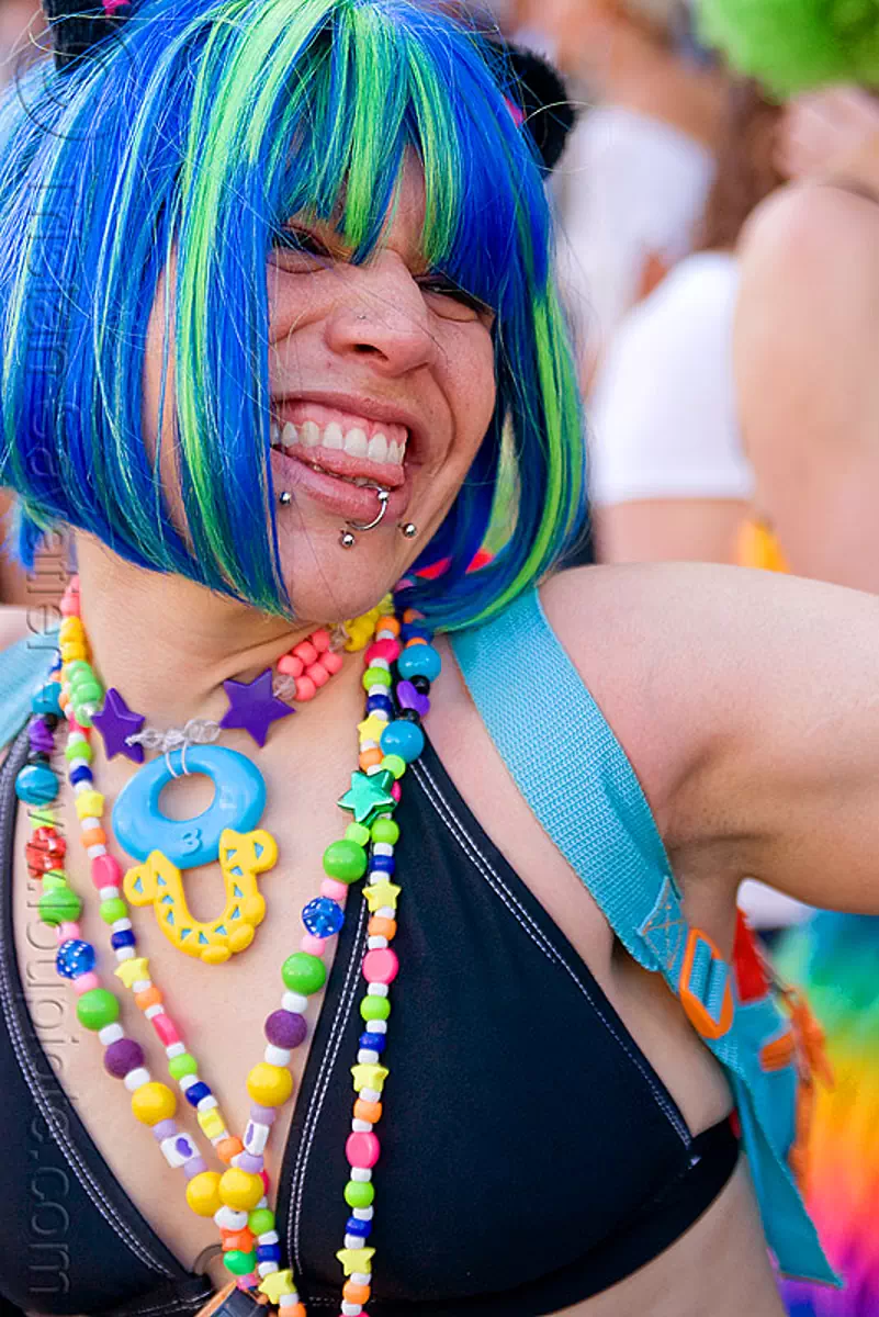 kandi raver woman - lip piercings - blue wig, beads, blue wig, kandi kid, kandi raver, lip piercing, necklaces, rave fashion, woman