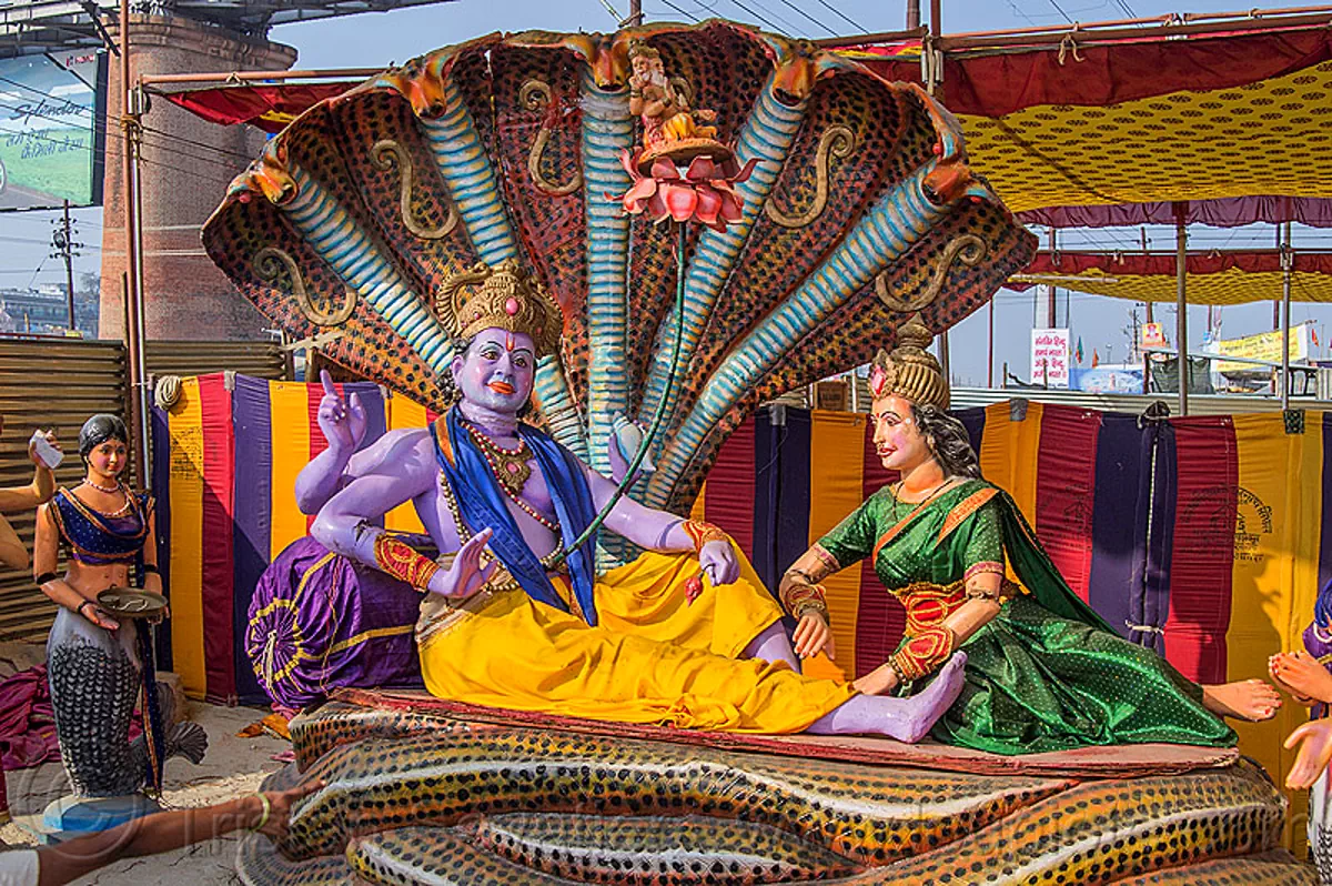 krishna - hindu god sculpture with five headed naga snake, ananta sesha, ashram, brahma, deities, gods, hare krishna, hindu pilgrimage, hinduism, iskcon, kitch, kumbh mela, laxmi devi, laxmi-narayana, naga snake, purple, sculptures, statues, vasuki, vishnu