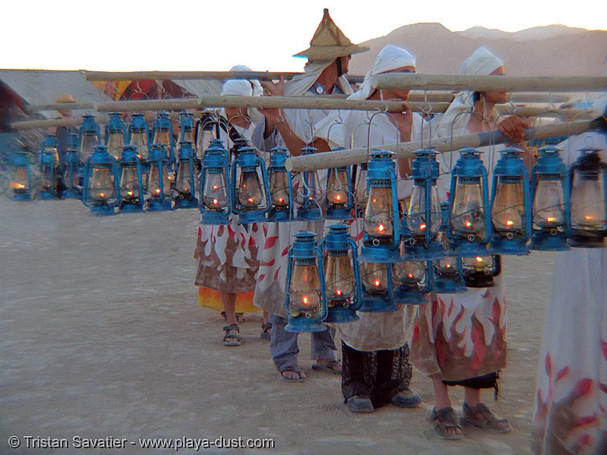 lamplighters - burning-man 2005, burning man, lamplighters, march, petrol lanterns, poles