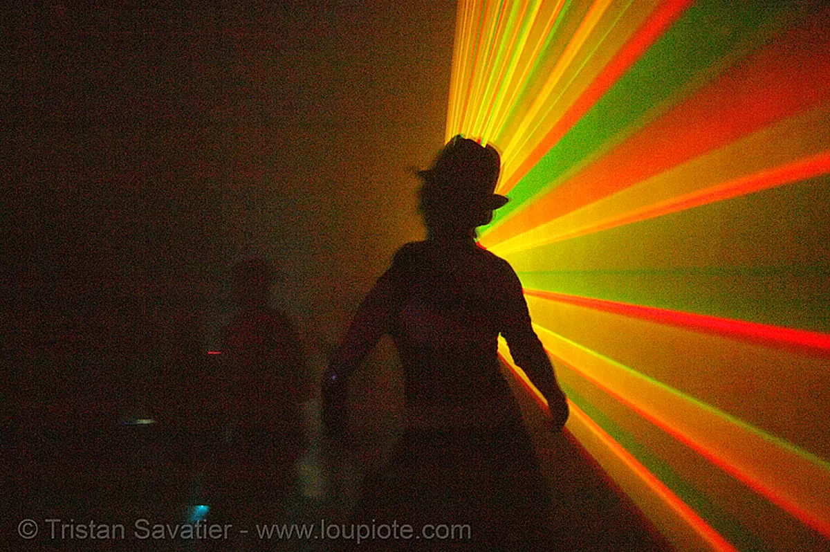 laser show - shadow in warehouse underground rave party, backlight, laser lightshow, laser show, lasers, nightclub, nightlife, rave lights, ravers, silhouettes