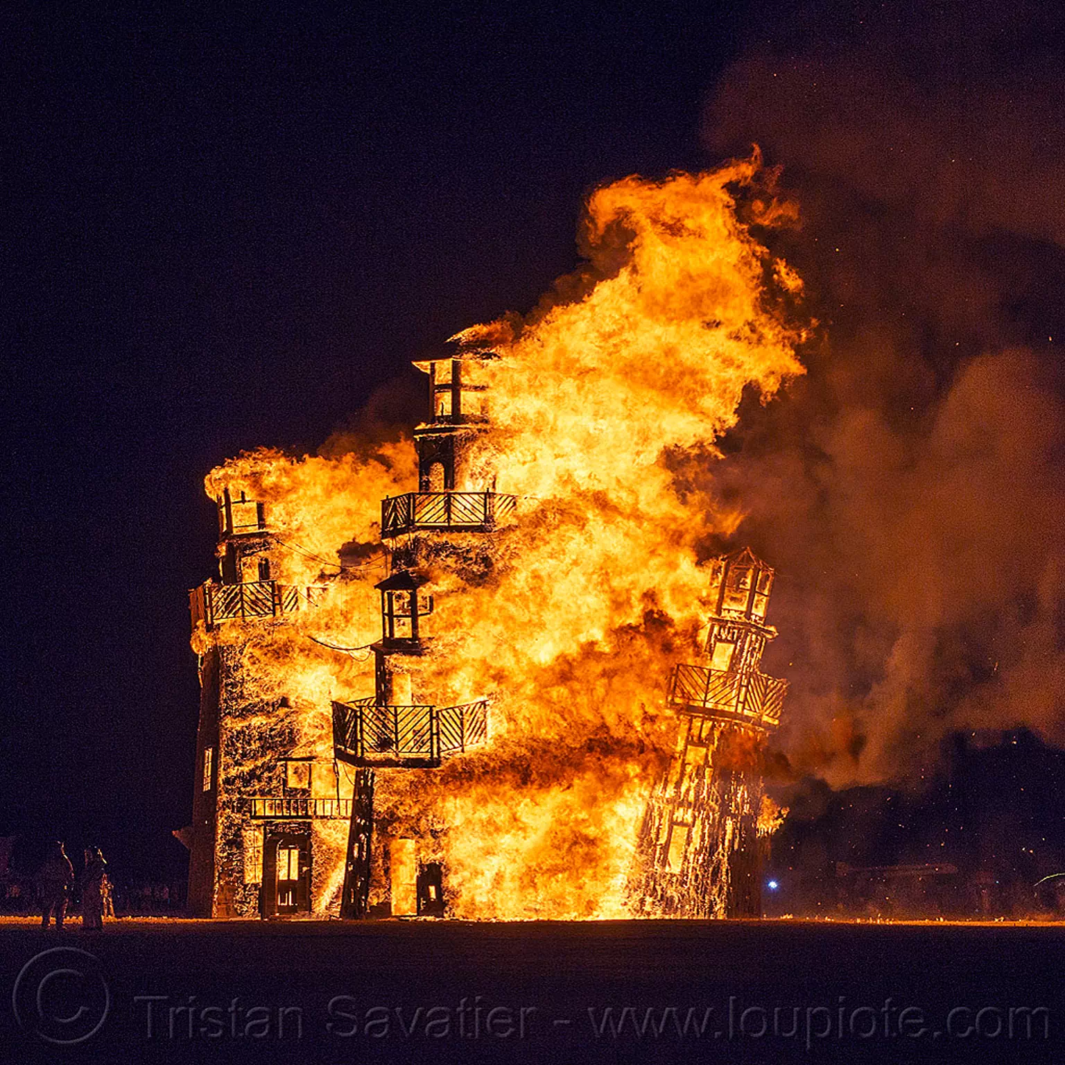 the lighthouse burning - burning man 2016, art installation, black rock lighthouse, burning man, fire, night