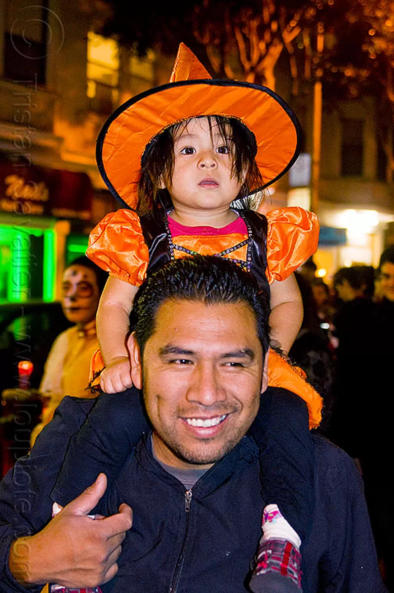 little girl in witch costume, child, daughter, day of the dead, dia de los muertos, father, halloween, kid, latino, little girl, man, night, orange color, witch costume, witch hat