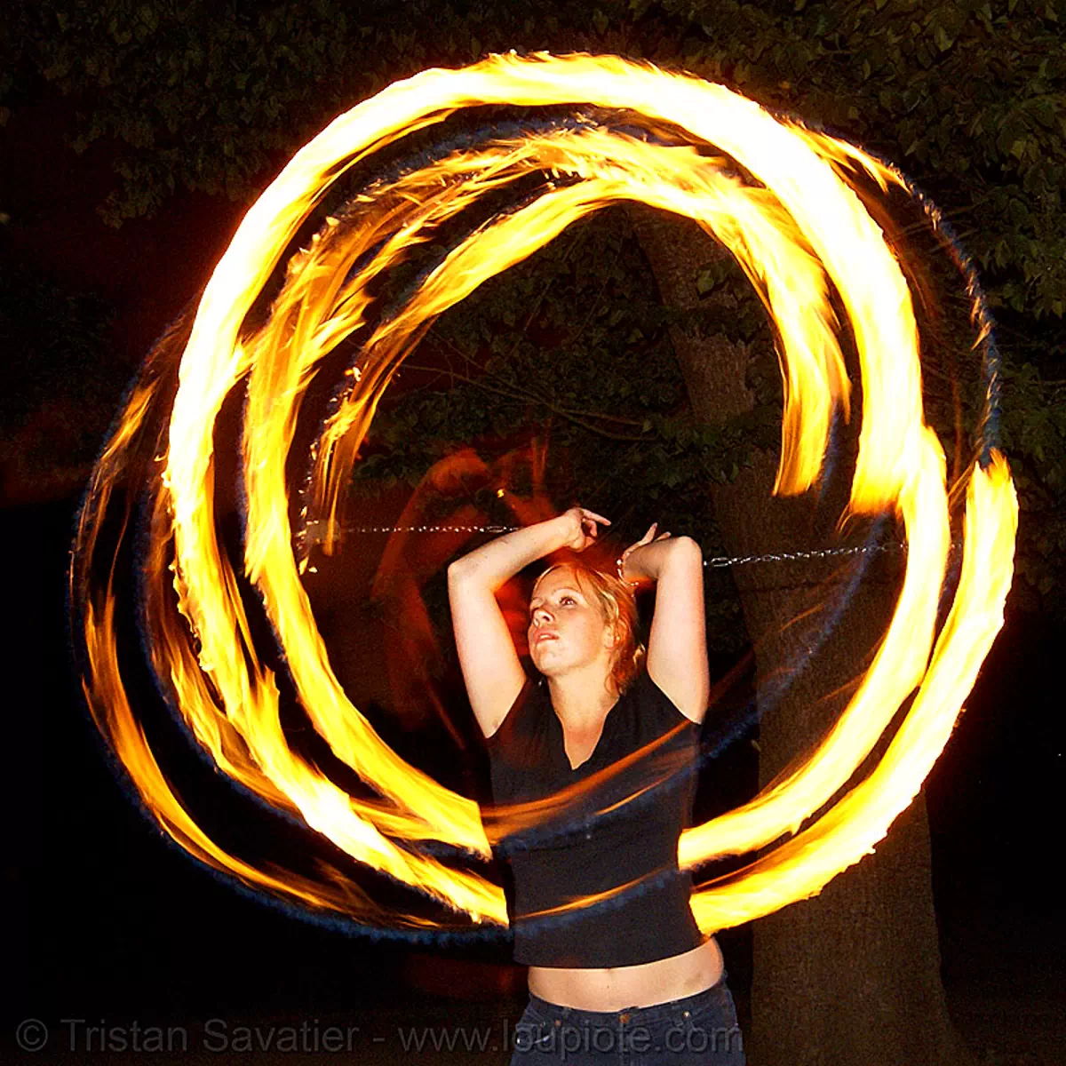 louise spinning fire poi, double poi, fire dancer, fire dancing, fire performer, fire poi, fire spinning, night, spinning fire