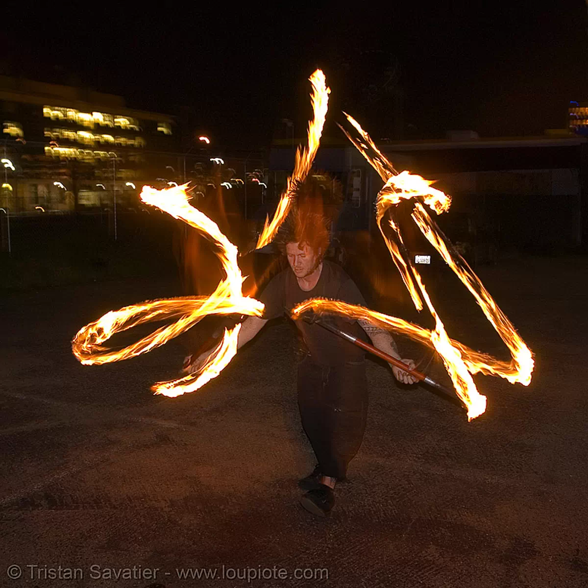 LSD fuego - fire performer spinning fire (san francisco), double staff, fire dancer, fire dancing, fire performer, fire spinning, fire staffs, fire staves, night, spinning fire