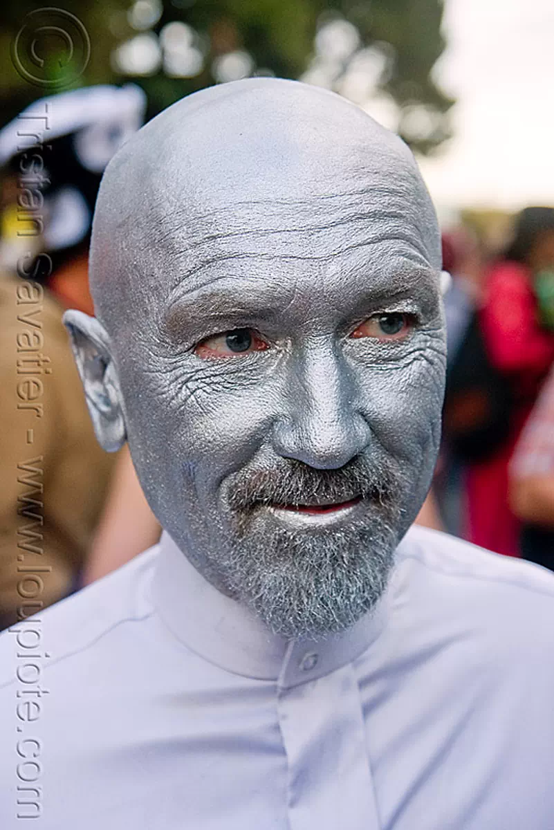 man with silver face paint, silver man, burning man decompression, san