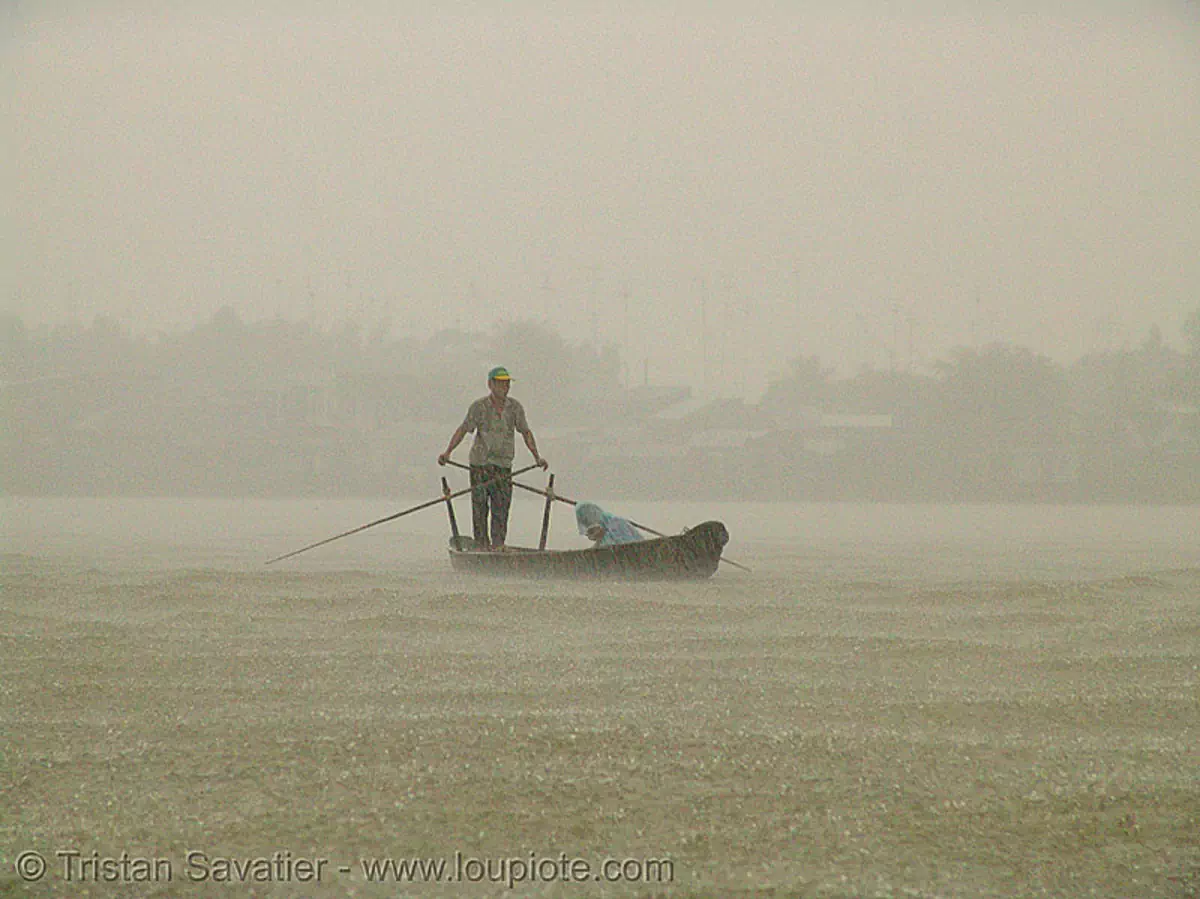 mekong river, monsoon rain, row boat, vietnam