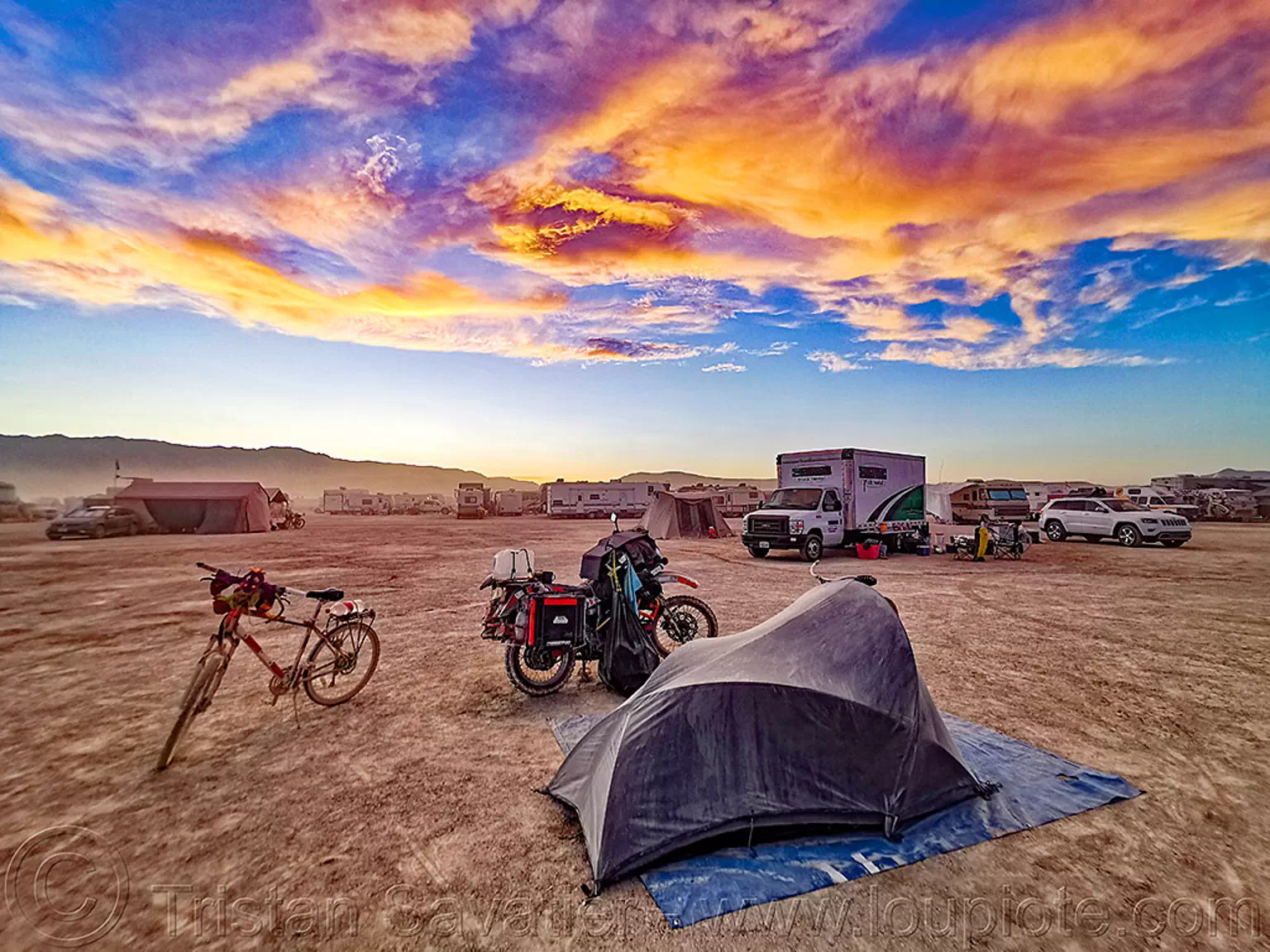 my small camp at sunset - burning man 2019, bicycle, burning man, camp, clouds, glowing, klr 650, motorcycle, sunset sky, sunset skybm, tent
