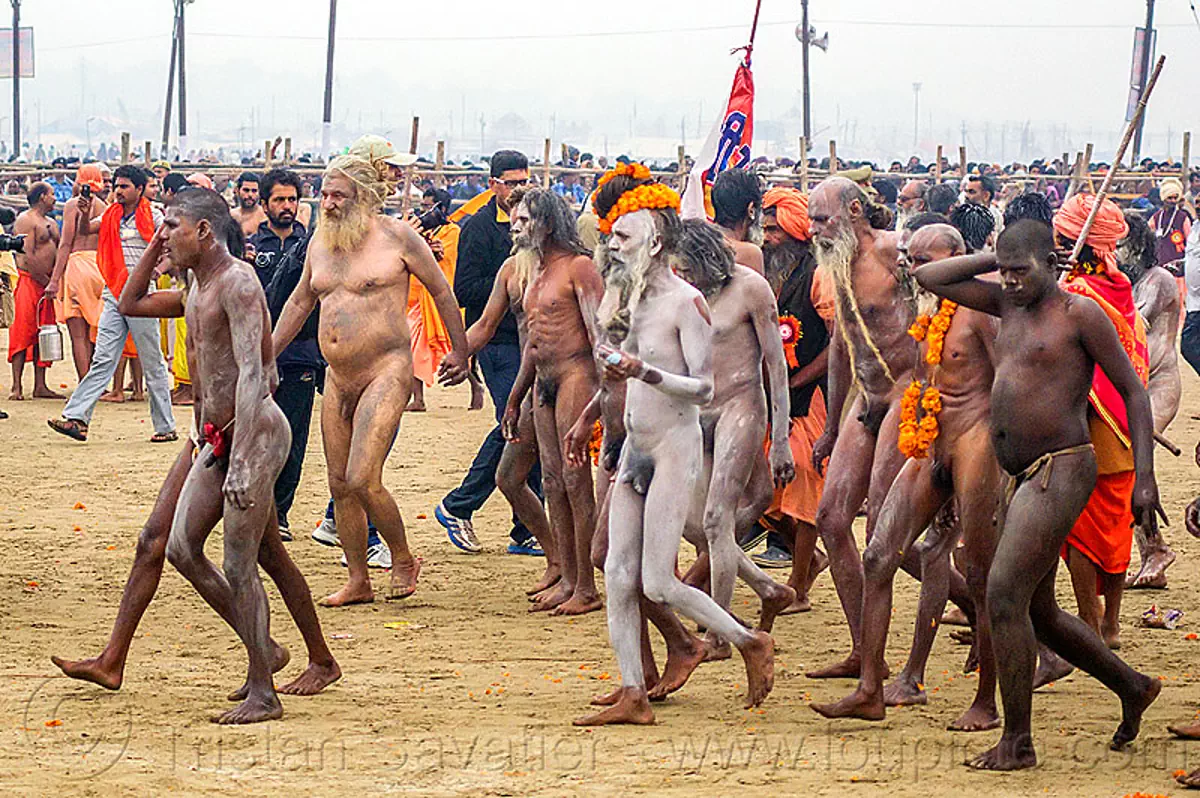 naked-hindu-devotees-walking-to-bank-of-ganges-river-kumbh-mela-india-13890419950.jpg