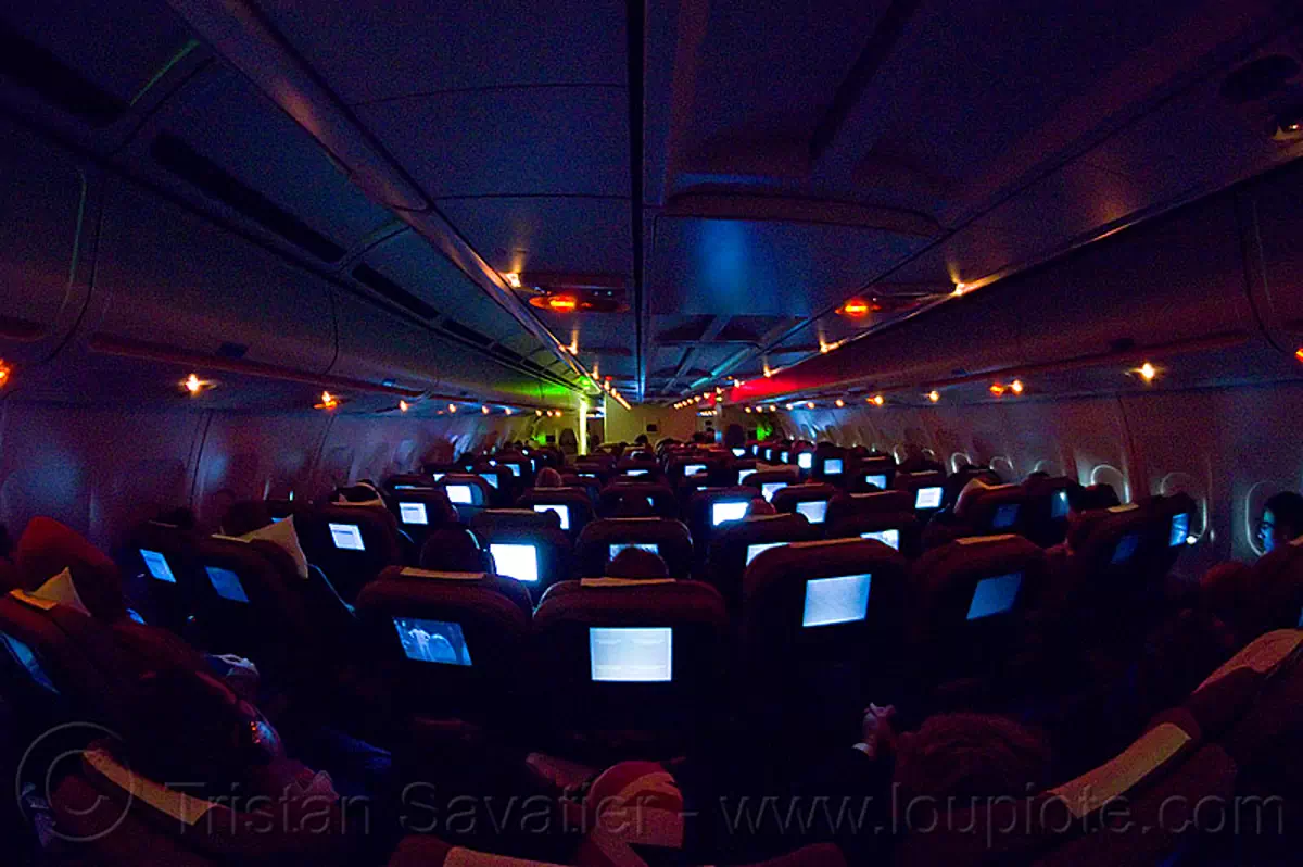 night flight - airbus A340 passenger cabin - glowing screens, airbus a340, flight lx-39, glowing, inside, interior, night, passenger cabin, passenger plane, swiss air, swiss international air lines, vanishing point, video screens