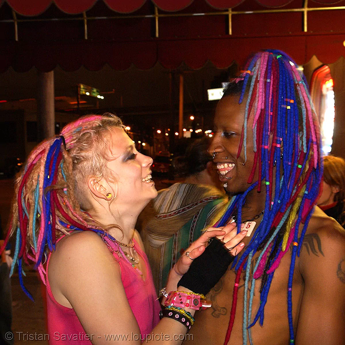 penny and page from the church of the perpetual party (san francisco), blue, church of the perpetual party, dreadlocks, man, night, page turner, penny arcade, perpetual-party.com, piercing, pink, qp, woman