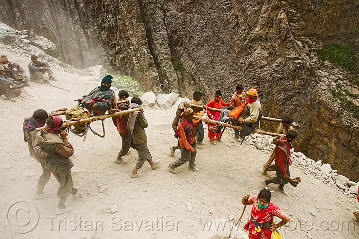 pilgrims on dandis / dholis (chairs carried by 4 porters) - amarnath yatra (pilgrimage) - kashmir, amarnath yatra, bearers, dandis, dolis, hiking, hindu pilgrimage, india, kashmir, men, mountain trail, mountains, pilgrims, porters, trekking, wallahs