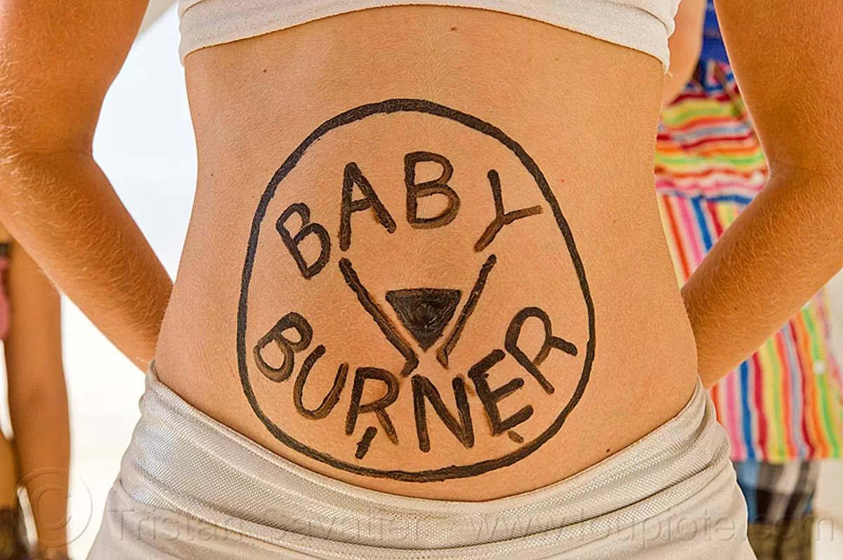 pregnant with baby burner, burning man 2013