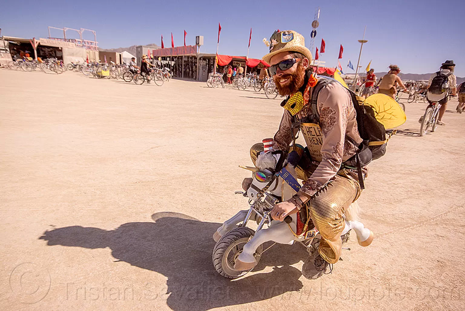 riding unicorn mini motorbike - burning man 2015, burning man, mini moto, mini motorbike, motorcycle, riding, unicorn