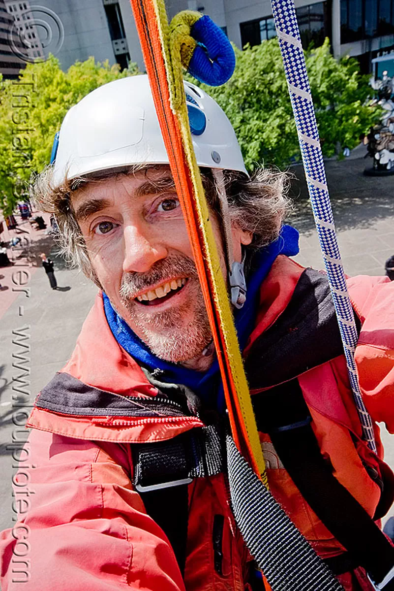 riding the zip-line over san francisco, adventure, cable line, cables, climbing helmet, embarcadero, hanging, man, mountaineering, self portrait, selfie, sling, steel cable, strap, trolley, tyrolienne, urban, zip line, zip wire