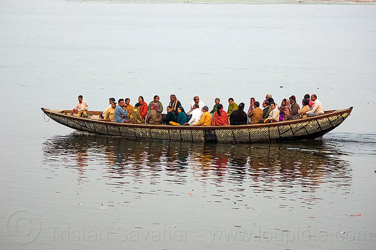 river boat sailing on ganges river, india