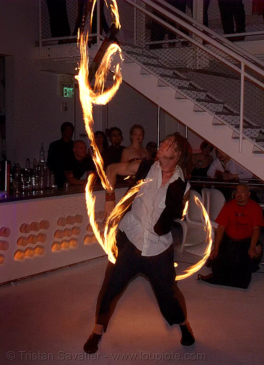 ro spinning fire staffs (san francisco), fire dancer