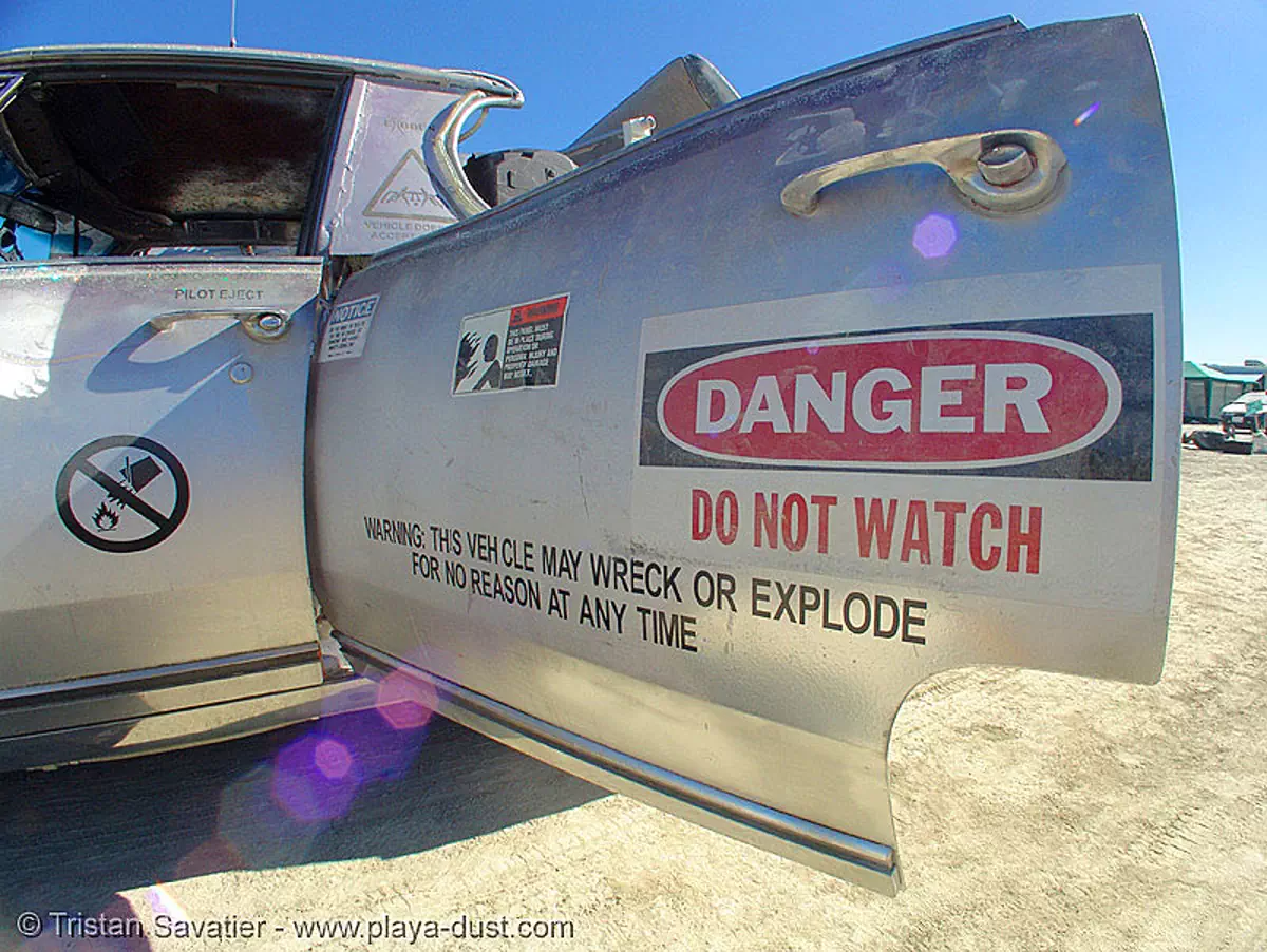rocket car - burning-man 2005, art car, burning man, danger, hazard, mutant vehicles, rocket car, safety sign, warning