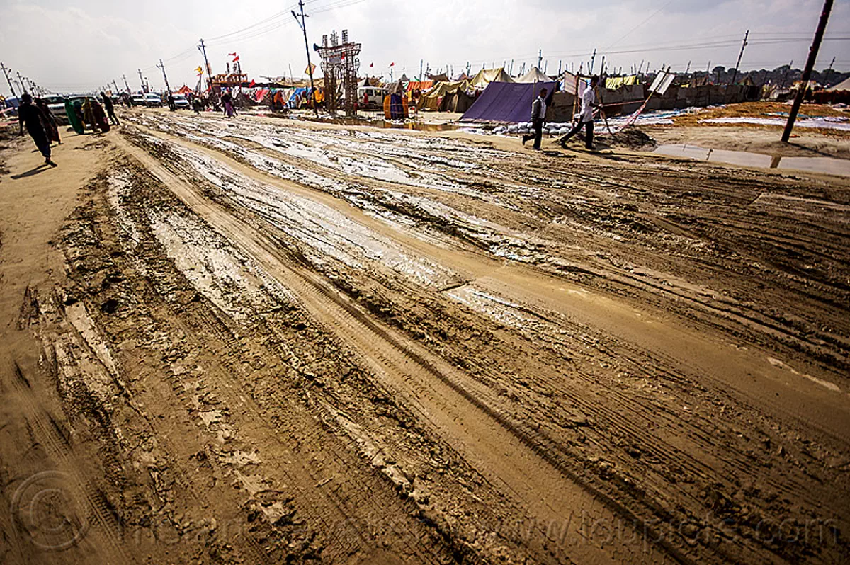 ruts on muddy road, india