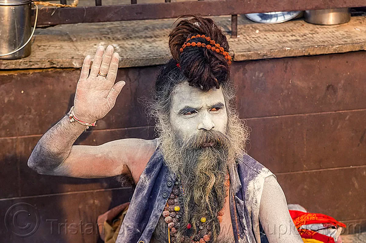 sadhu (hindu devotee) with face covered with vibhuti holy ash, nepal