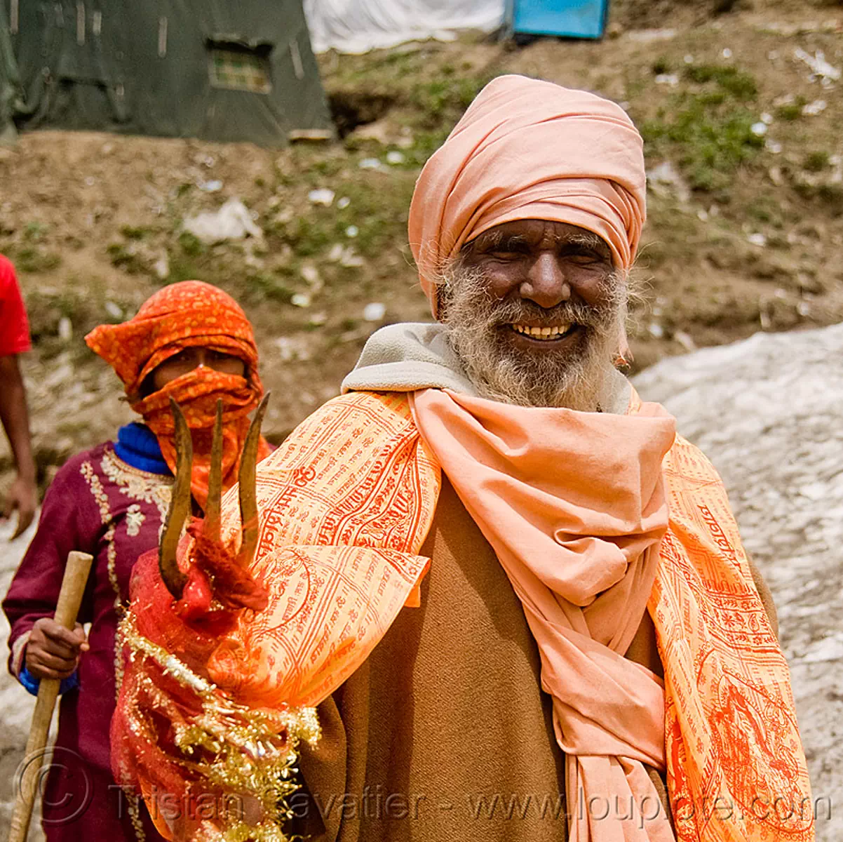 sadhu (hindu holy man) with trident - amarnath yatra (pilgrimage) - kashmir, amarnath yatra, baba, beard, bhagwa, hiking, hindu holy man, hindu pilgrimage, hinduism, india, kashmir, mountain trail, mountains, old man, pilgrim, sadhu, saffron color, trekking, trident