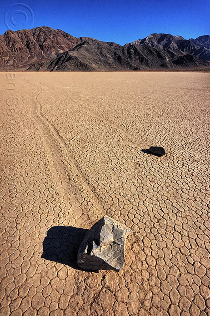 sailing stones on the racetrack (death valley), cracked mud, death valley, dry lake, dry mud, mountains, racetrack playa, sailing stones, sliding rocks