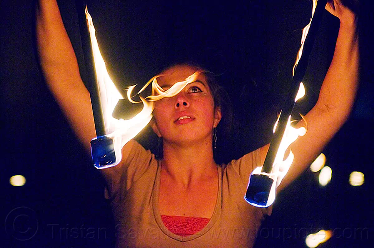 spinning double fire staff