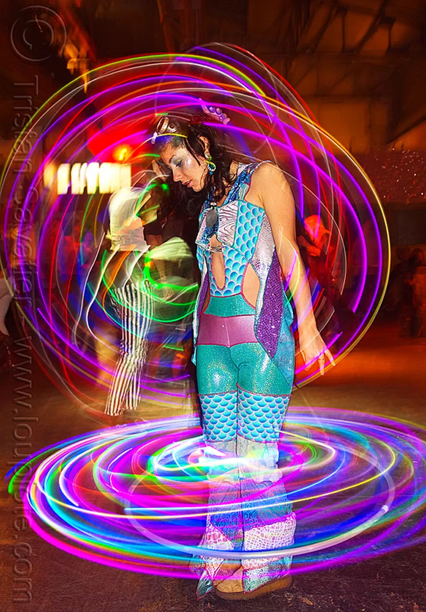 spinning LED hoops, cell space, glowing, grace hoops, hooper, hula hoop, led hoops, led lights, light hoop, night, woman