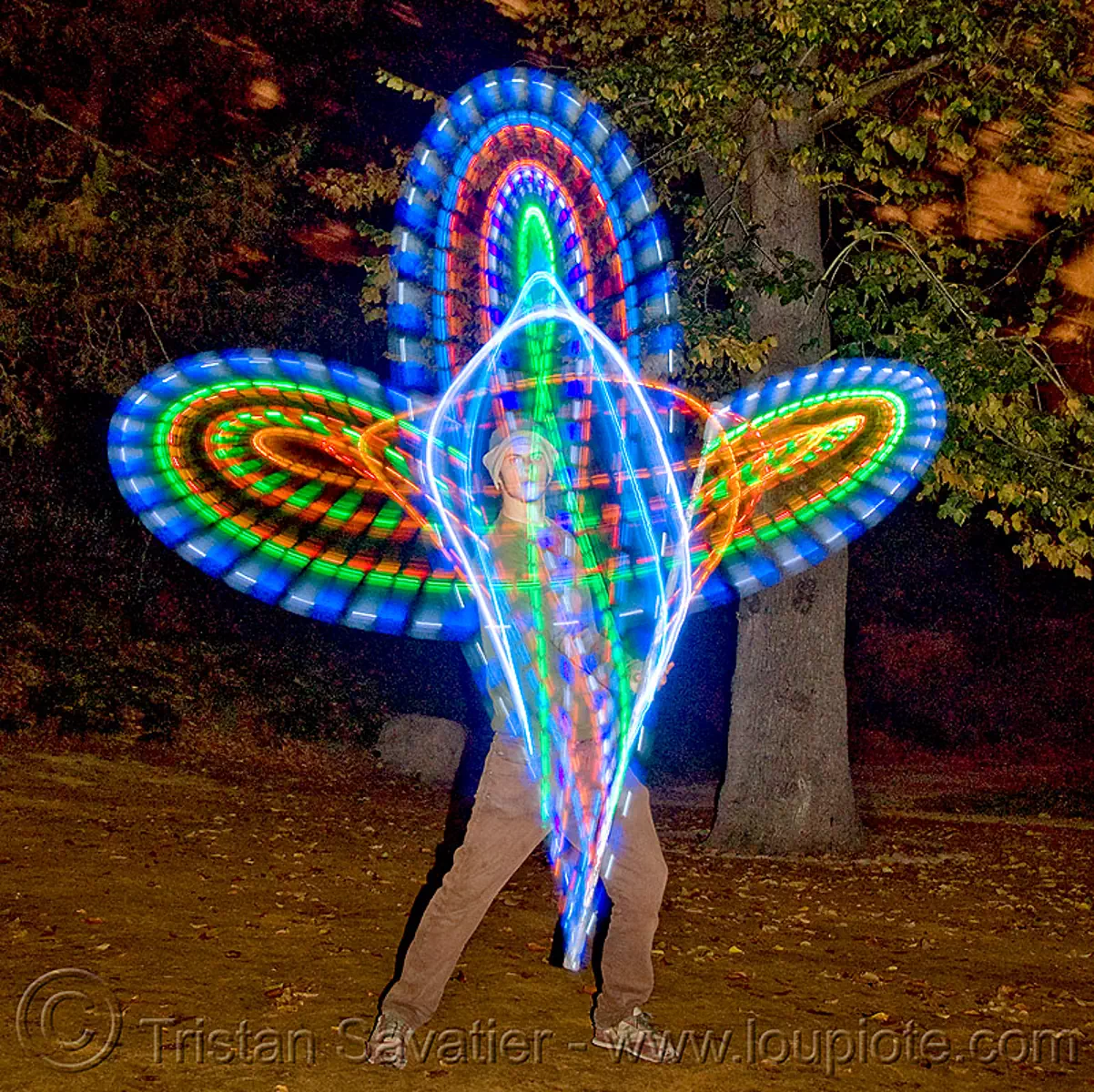 spinning LED light staff, glowing, flowlight