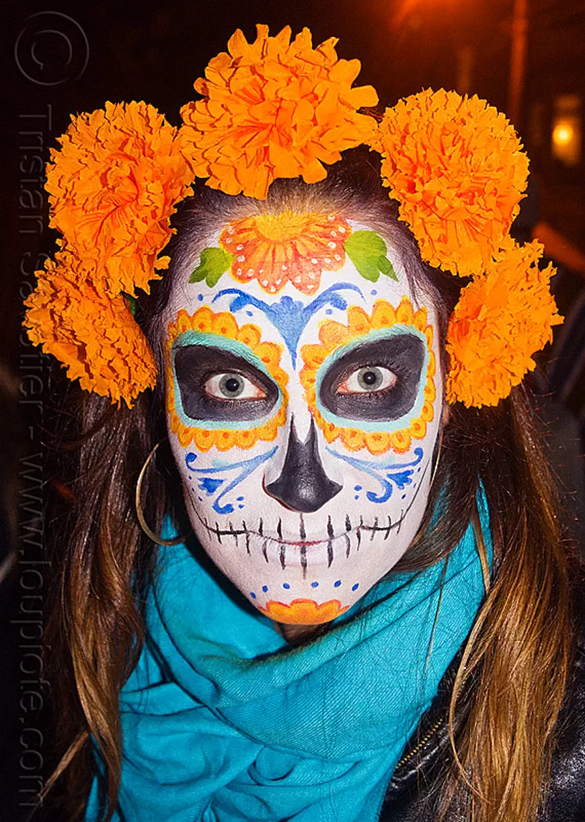 sugar skull makeup, orange marigold flowers headdress